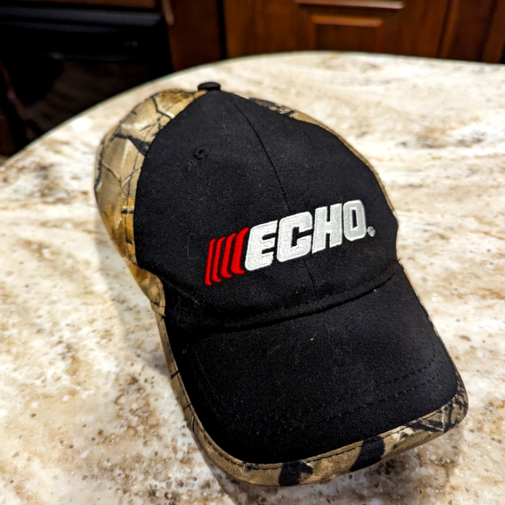Echo camouflage ball hat ,cap. GUC. 7.5 inches in diameter . Adjustable.